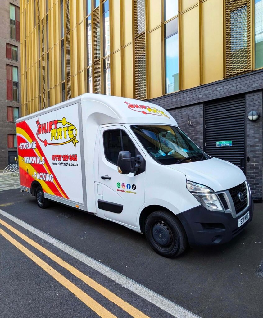 House removals Solihull – ShiftMate Removals van outside a modern building
