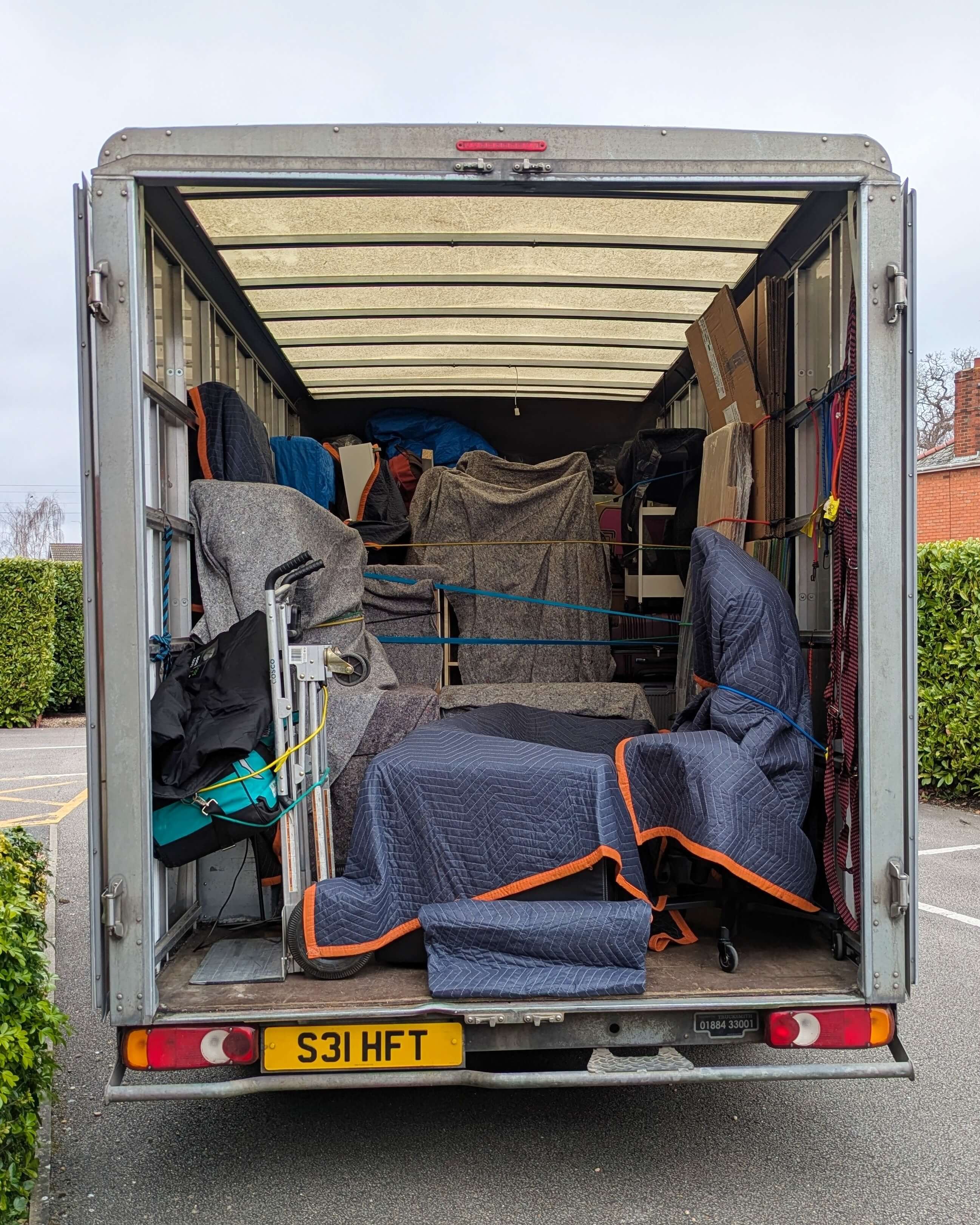 Careful furniture loading Solihull with protective blankets and secure strapping