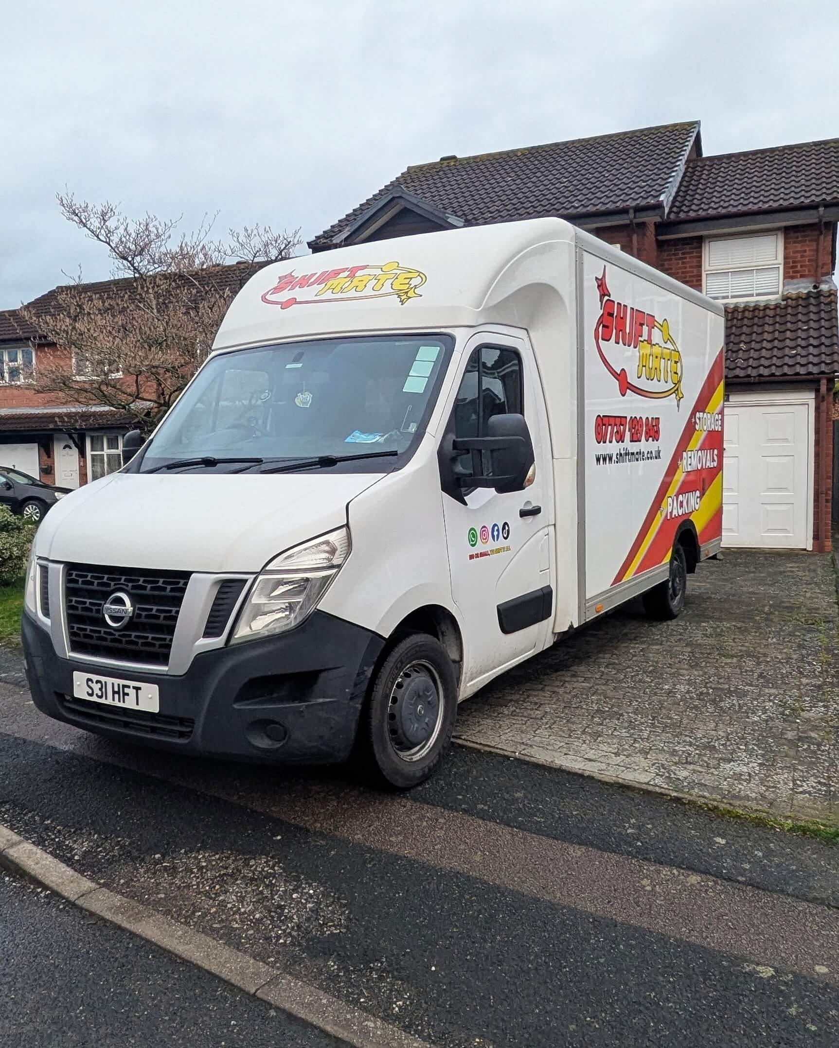 House removals in Coventry with van parked outside residential home