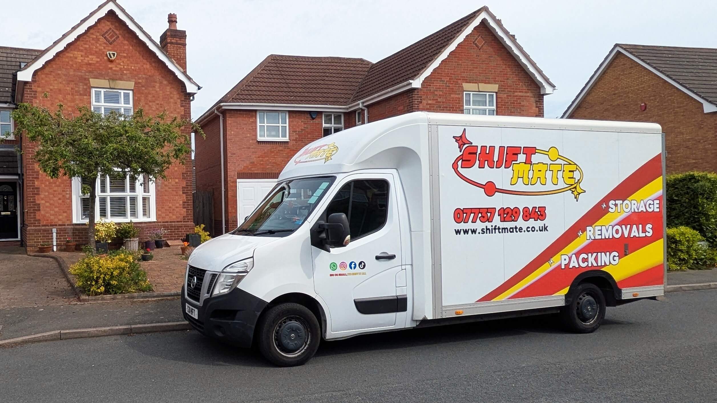 House removals UK – ShiftMate Removals van outside residential home