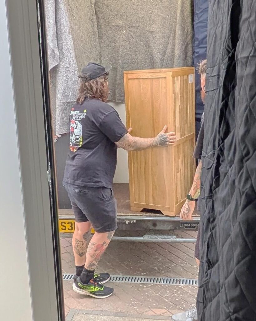ShiftMate Removals loading furniture into a Luton van in Birmingham
