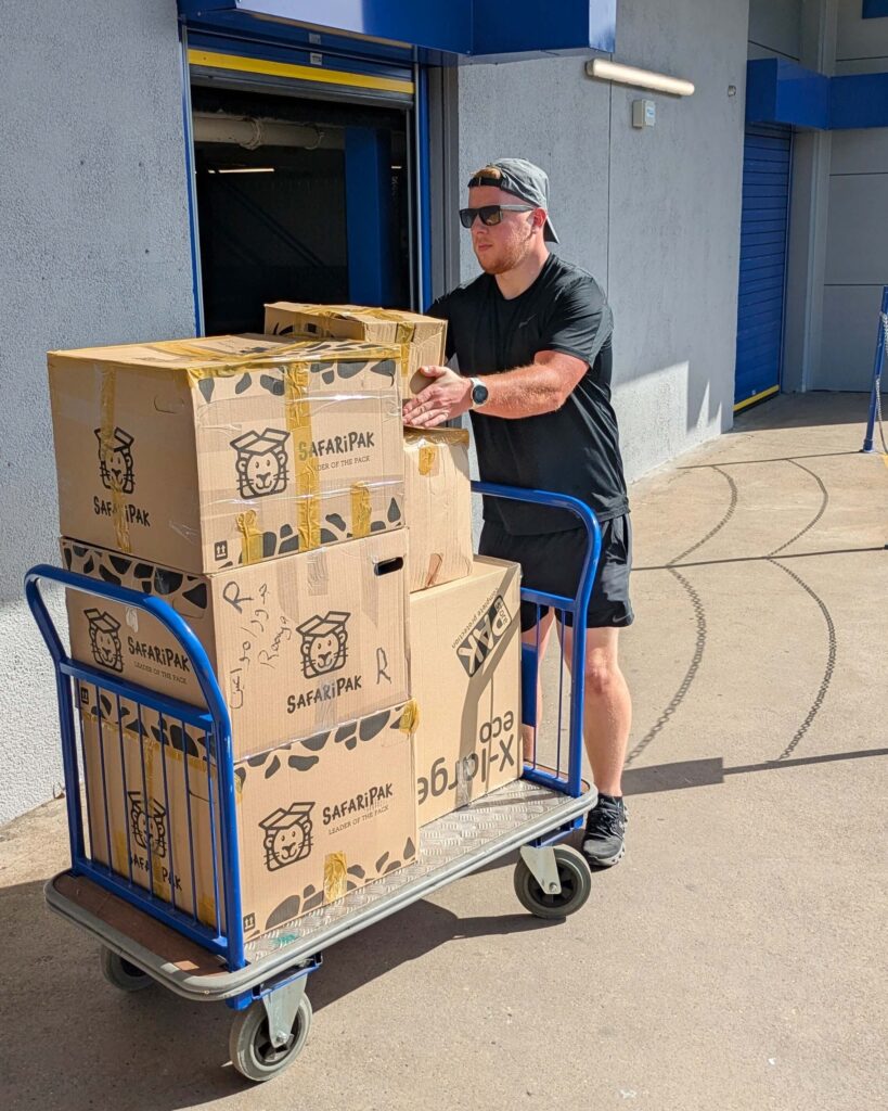 Man and van services collecting boxes from a storage unit in Birmingham