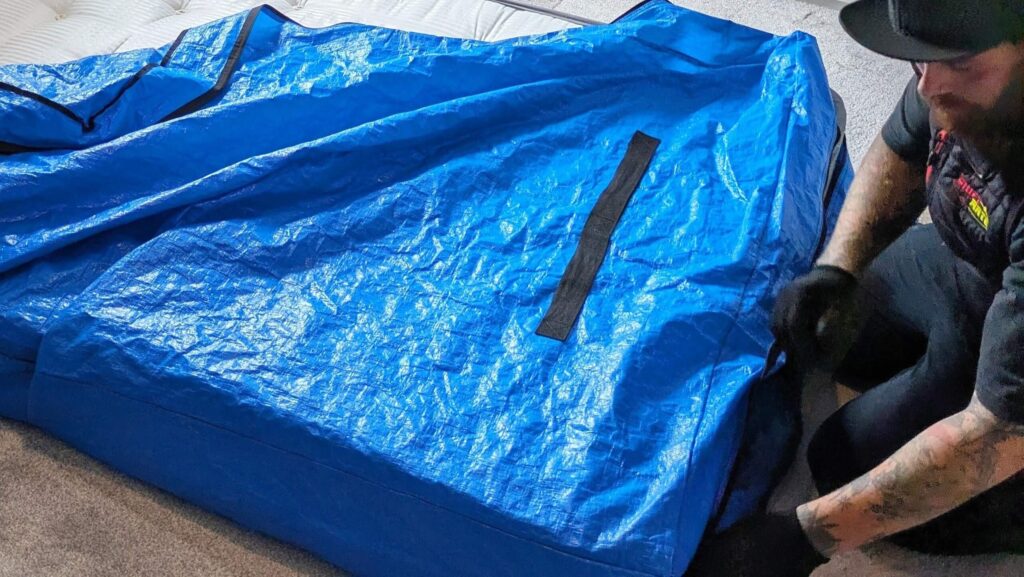 Professional mattress protection and packing service before a house move