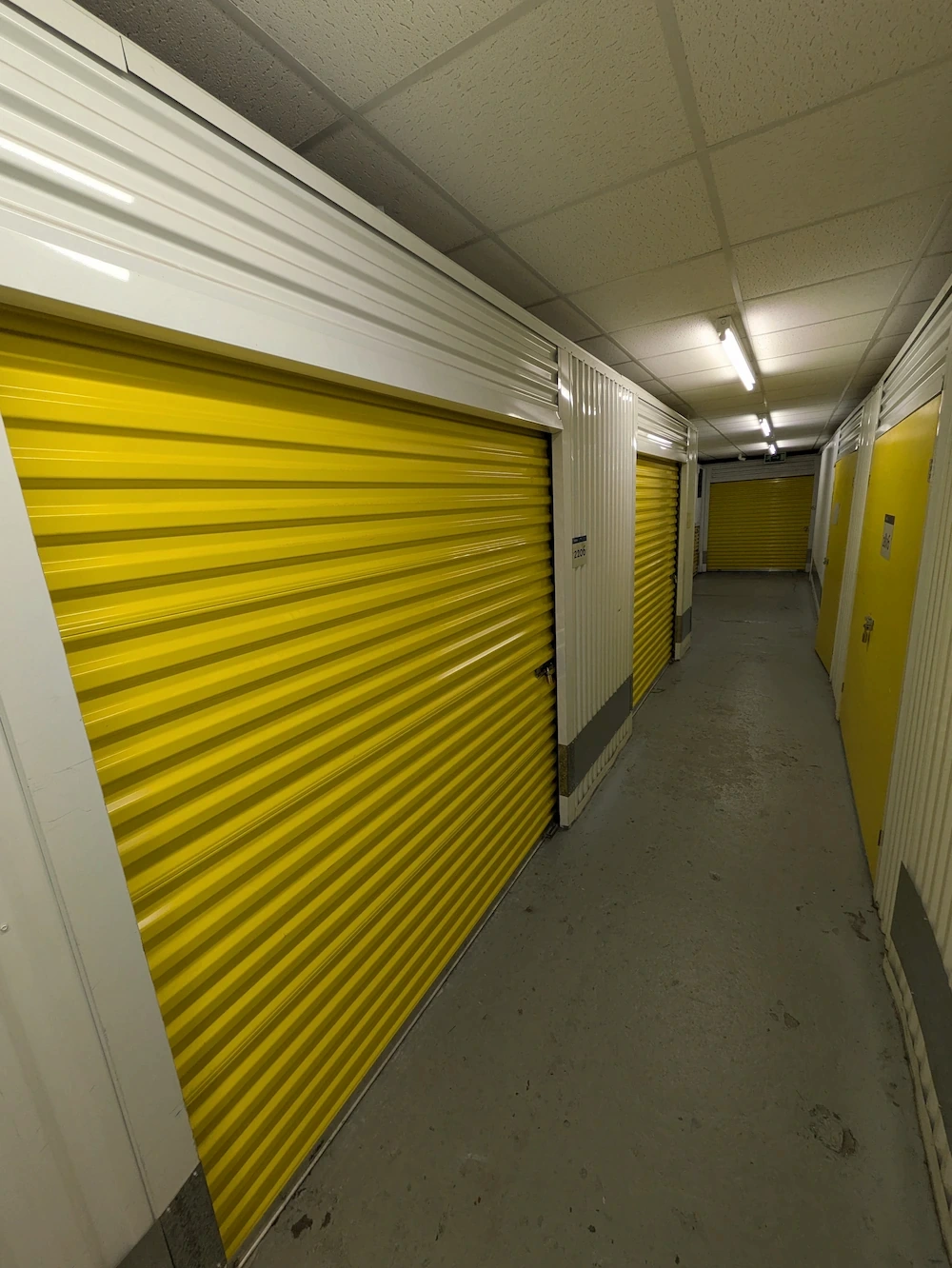 Secure indoor storage units in Birmingham with lockable yellow doors